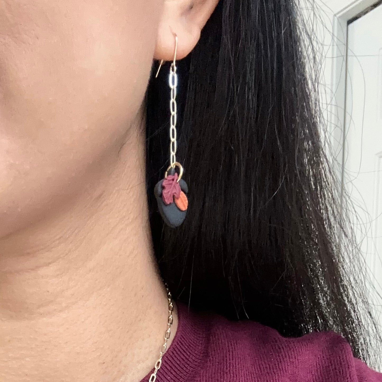 Acorn chain earrings.
