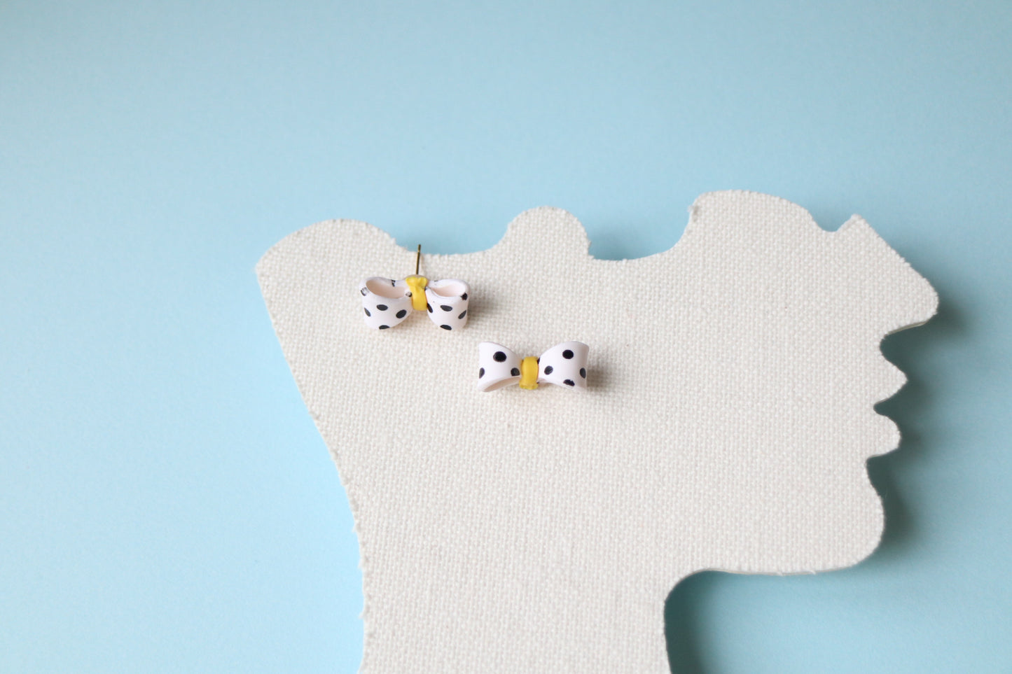 Polka dots bow studs