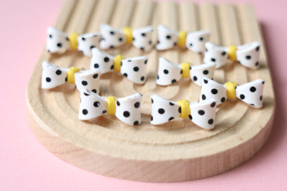 Polka dots bow studs