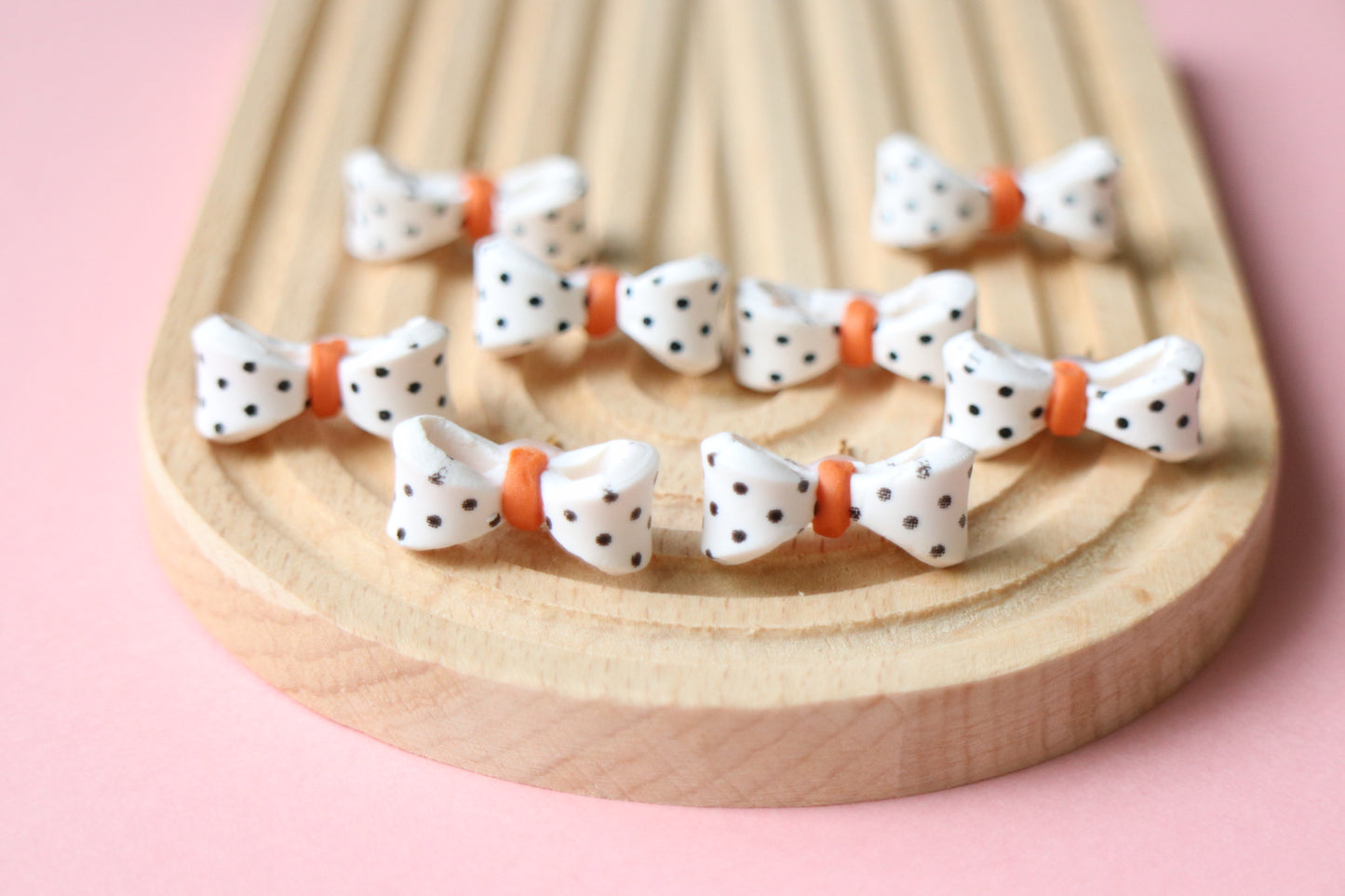 Polka dots bow studs