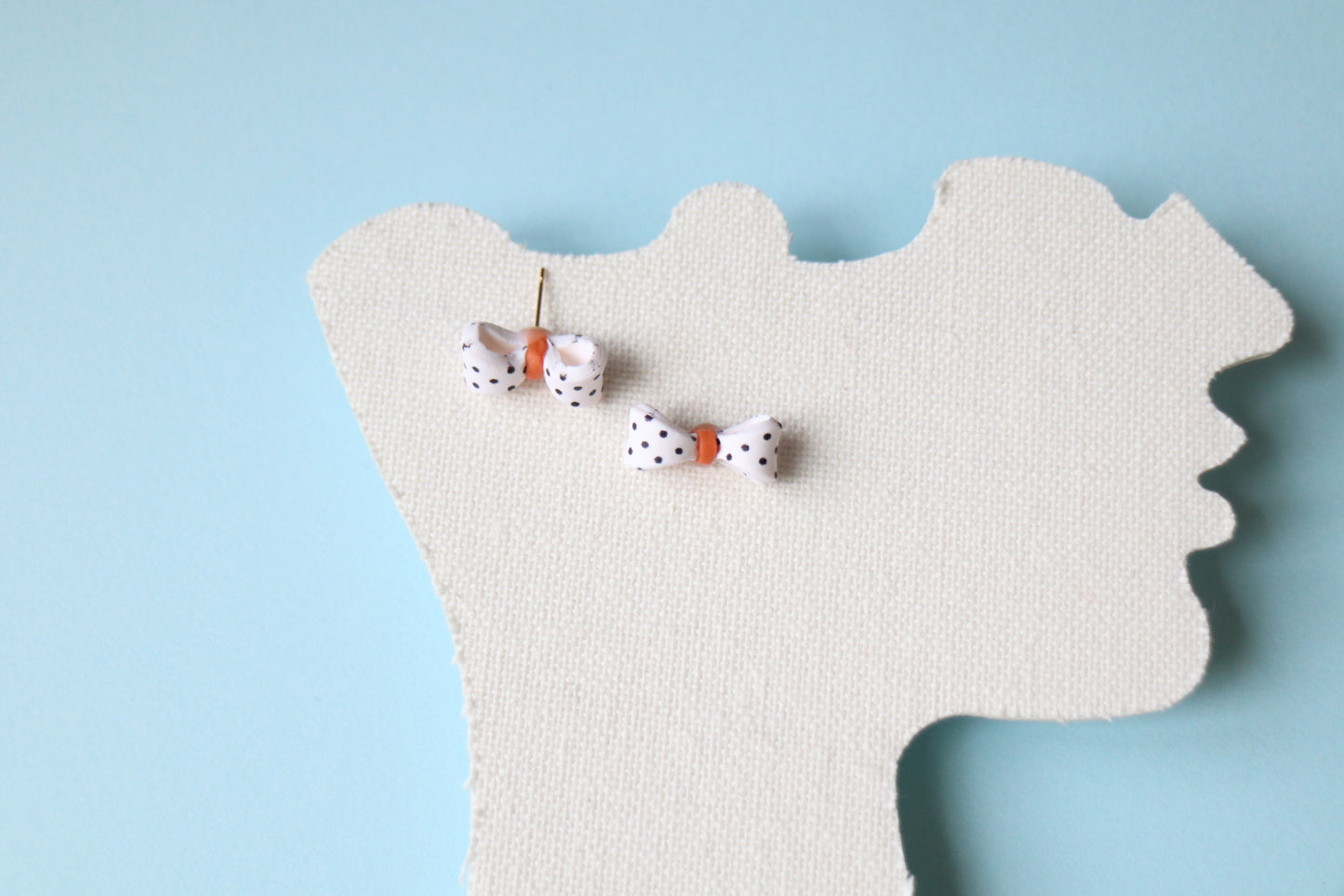 Polka dots bow studs